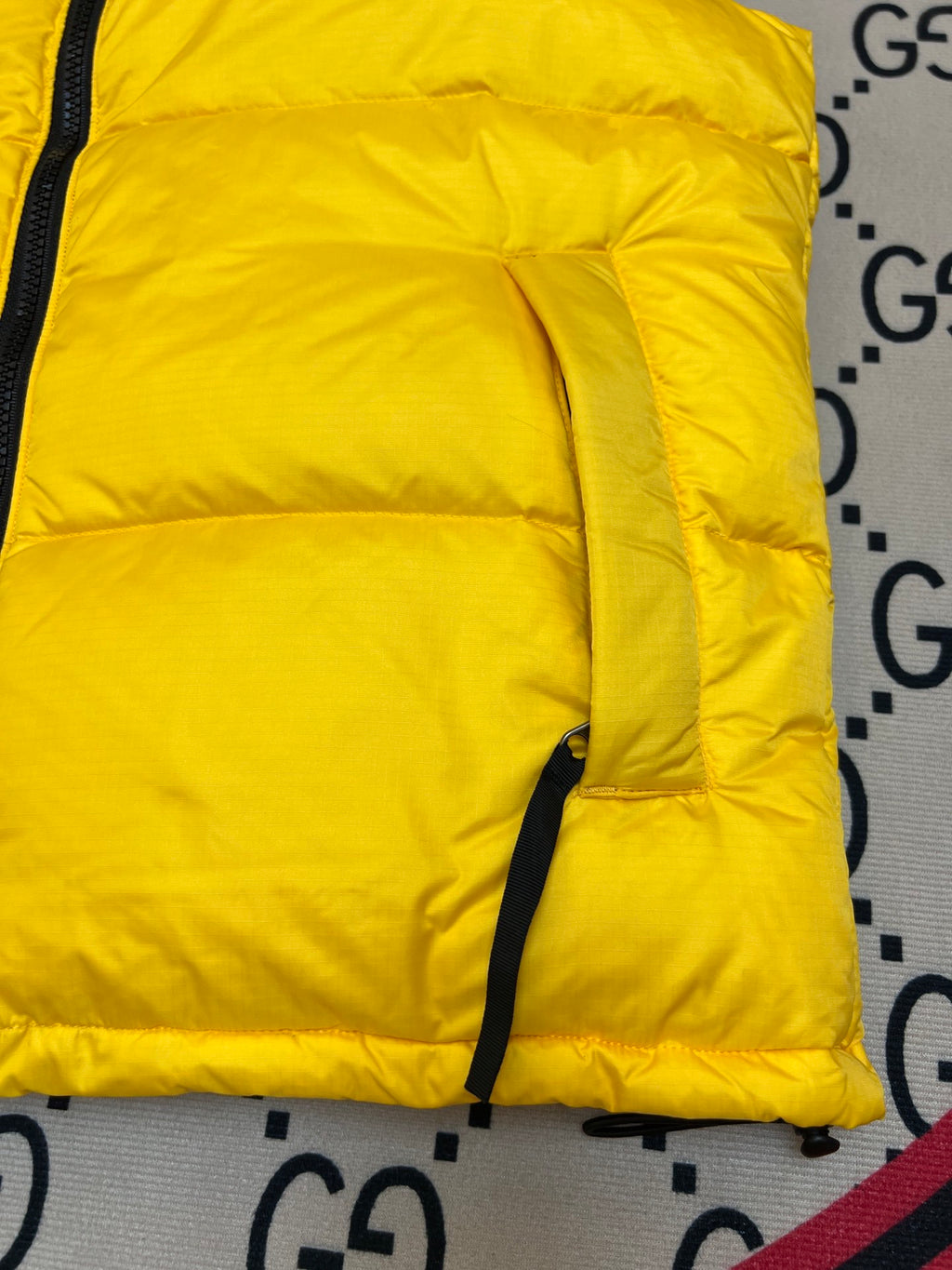 The North Face Yellow and Black Colorblock Puffer Vest