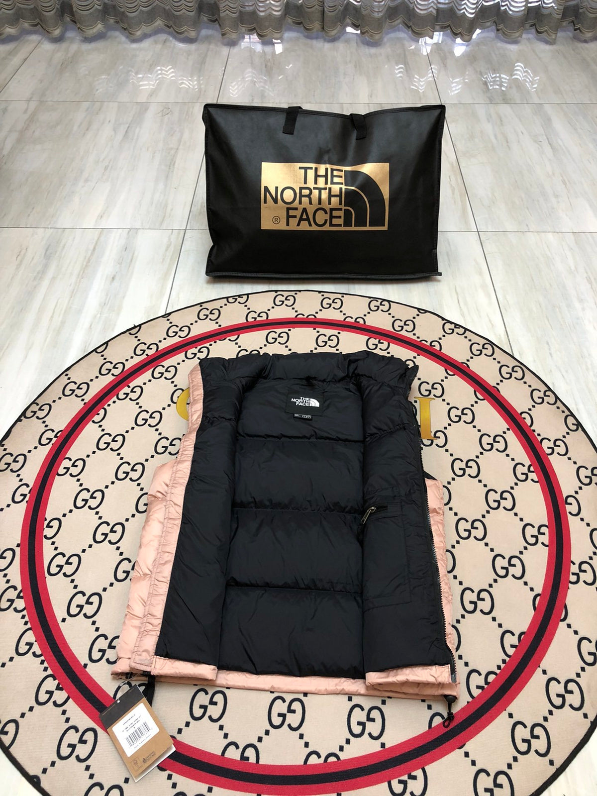 The North Face Blush Pink and Black Colorblock Puffer Vest