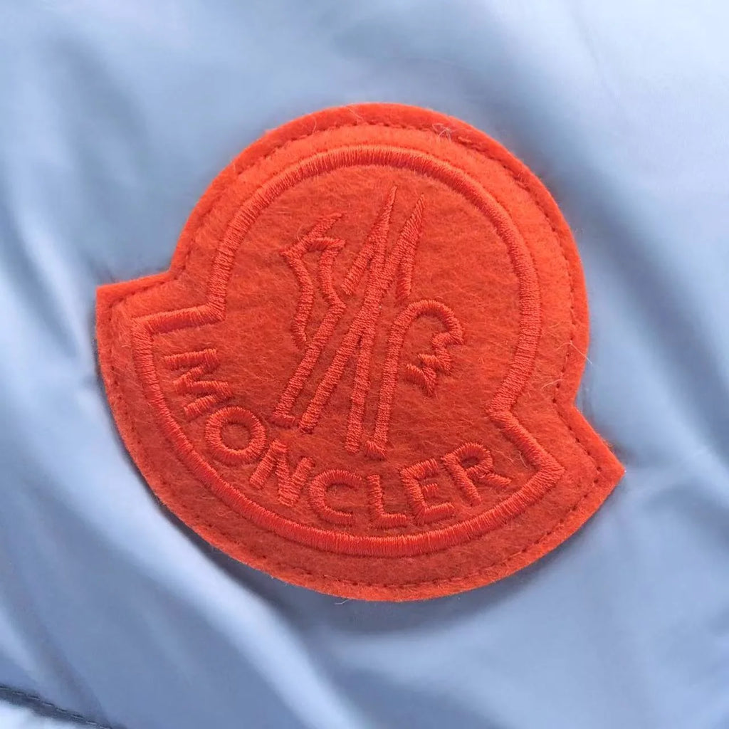 Moncler Ice Blue Hooded Puffer Jacket with Orange Logo